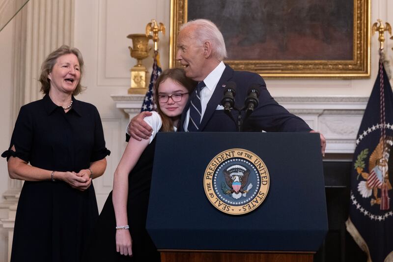 US president Joe Biden Alsu Kurmasheva's daughter, Miriam Butorinm (C), and Paul Whelan's sister, Elizabeth Whelan (L). Photograph: Michael Reynolds/EPA-EFE