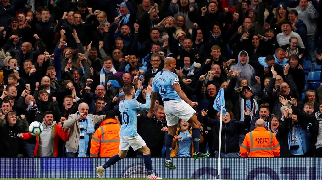 Manchester City’s Vincent Kompany celebrates scoring against Leicester. Photograph: Reuters