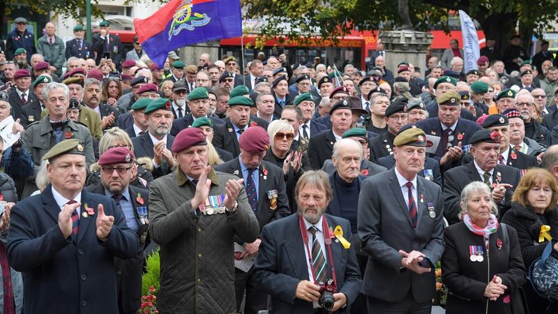 A crowd gathers outside St Andrew’s Church during a funeral service for Dennis Hutchings on Thursday in Plymouth, England. The 80-year-old British army veteran died after contracting Covid-19 while on trial for the attempted murder of John Pat Cunningham in 1974. Photograph: Finnbarr Webster/Getty Images