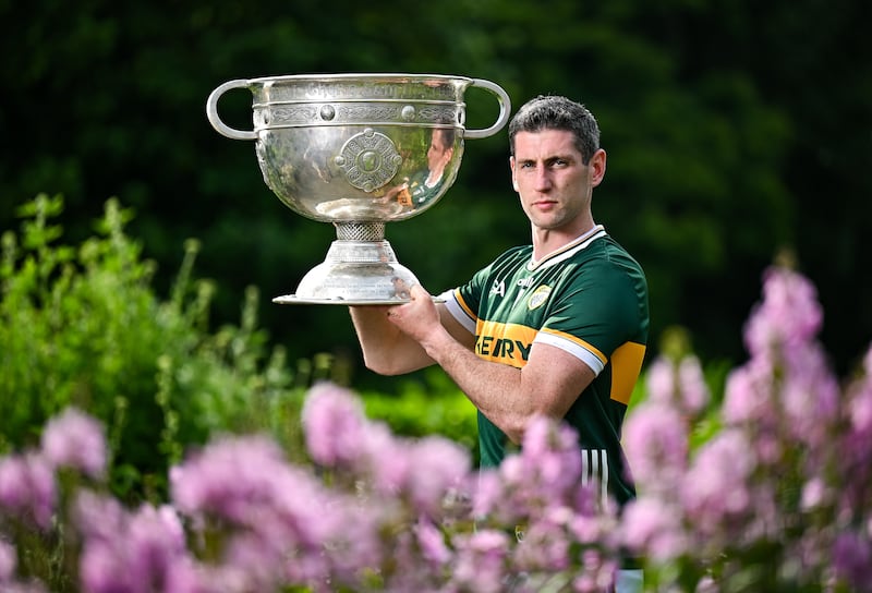 Kerry footballer Paul Geaney with the Sam Maguire Cup at the National Botanic Gardens in Dublin for the launch of the All-Ireland SFC knockout stages. Photograph: Sam Barnes/Sportsfile