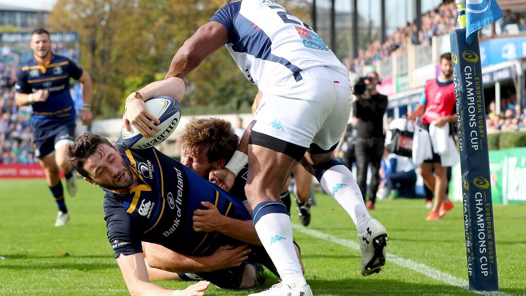 Leinster’s Barry Daly secures a bonus point as he gets over for their fourth try despite Frans Steyn and Timoci Nagusa of Montpellier during the Champions Cup game at the RDS. Photograph: James Crombie/Inpho