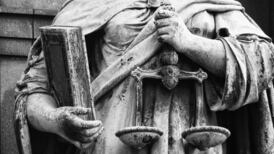 Man jailed for striking his wife with kettlebell has sentence cut