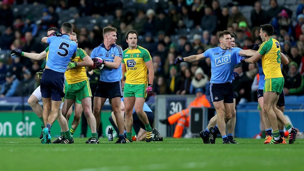 Tempers flare during the second half of the Dublin v Donegal game at Croke Park that led to to both Donegal’s Michael Murphy and Dublin’s James McCarthy to be sent off for receiving second yellow cards. Photograph: Donall Farmer/Inpho