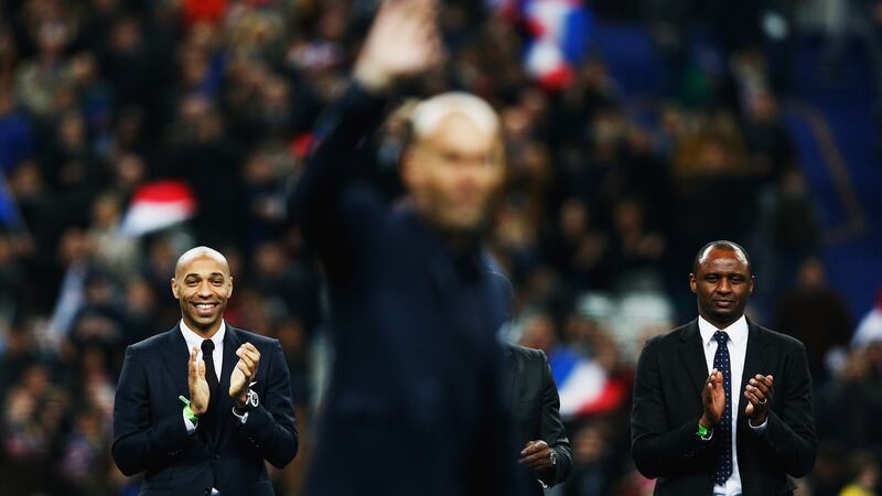 Henry and Vieira applaud Zinedine Zidane. Photo: Dean Mouhtaropoulos/Getty Images