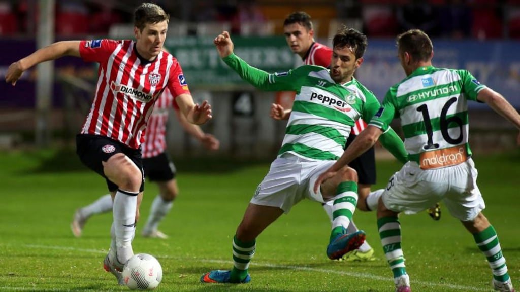 Patrick McEleney of Derry City takes on Shamrock Rovers pair Maxime Blanchard and Patrick Cregg during the Premier Division game at the Brandywell. Photograph: Lorcan Doherty/Inpho.