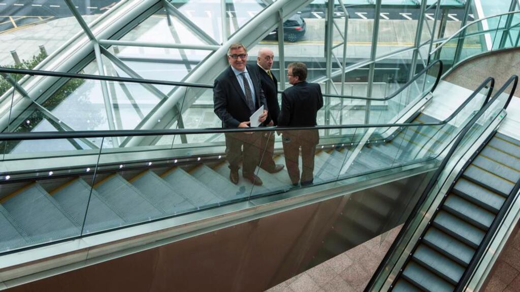 Tom Kavanagh, Founding Partner, Kavanagh Fennell, John Mulcahy, Head of Asset Management NAMA, with economist Jim Power, at the Business & Finance Corporate Restructuring Summit. Photograph: John T Ohle