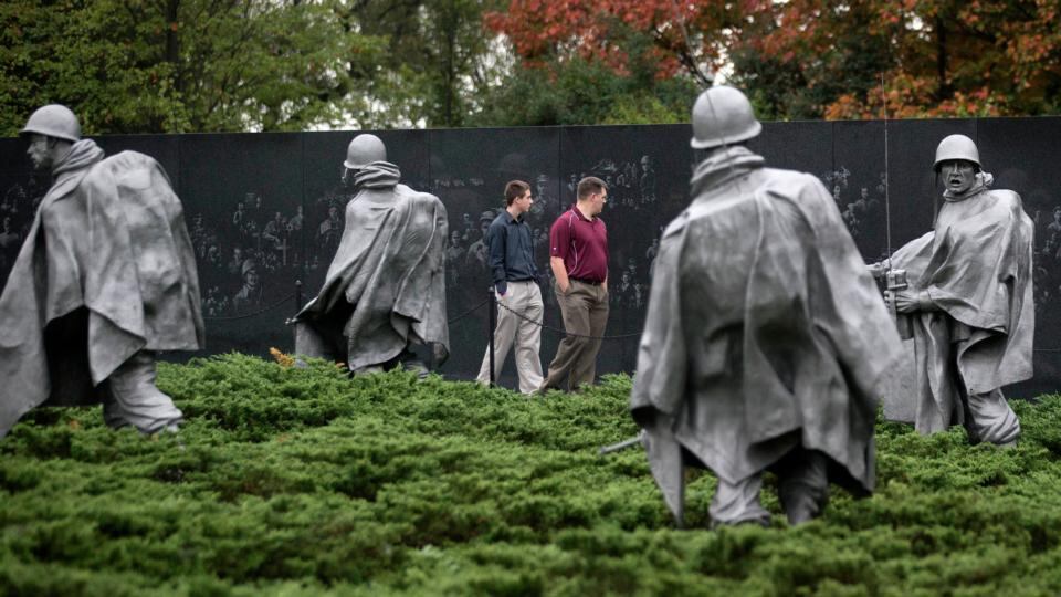 Visitors walk through the Korean War Veterans Memorial in Washington, DC, after the facility reopened. Photograph: Andrew Harrer/Bloomberg