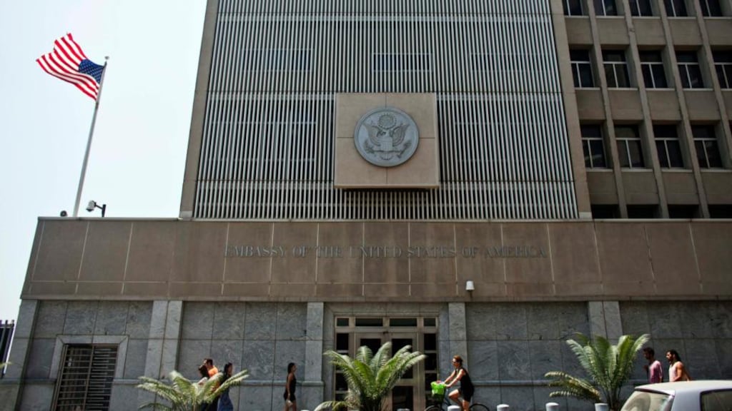 Pedestrians walk past the US embassy in Tel Aviv today. US embassies that would normally be open this Sunday - including those in Abu Dhabi, Baghdad and Cairo - will be closed that day because of unspecified security concerns, the US state department said. Photograph: Nir Elias/Reuters.