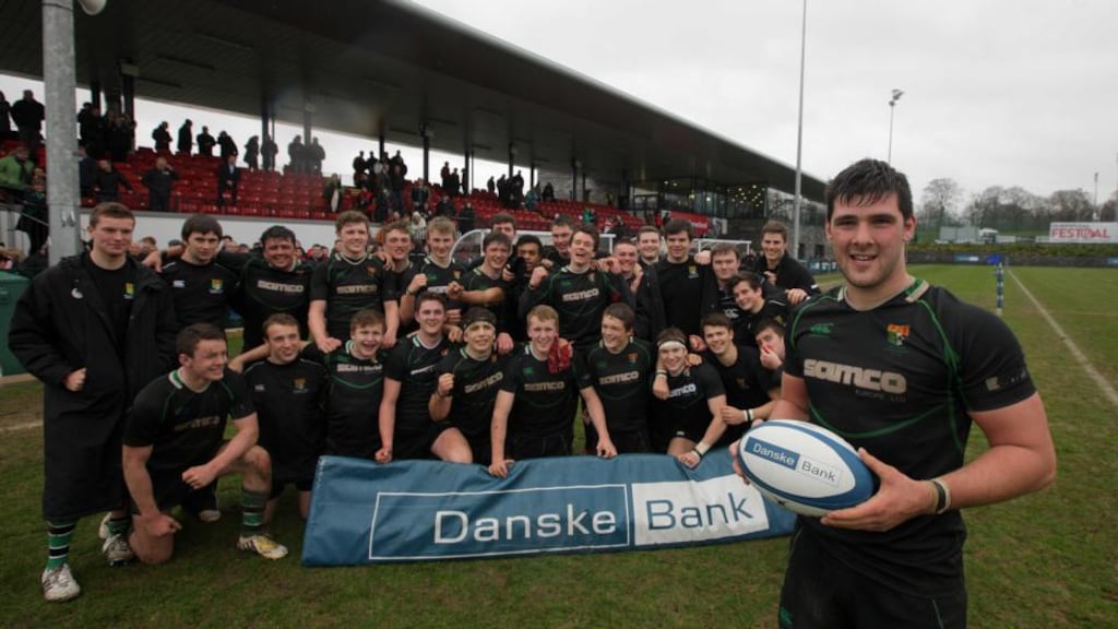 Sullivan captain Ross Todd and his team-mates celebrate after defeating Coleraine in the semi-final. Photograph: Inpho