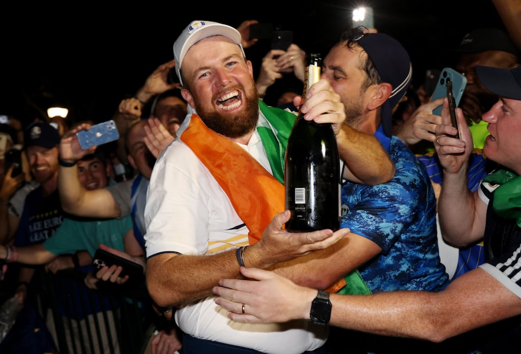 Shane Lowry celebrating with supporters of Europe after Sunday's Ryder Cup triumph. Photograph: Harry How/Getty Images