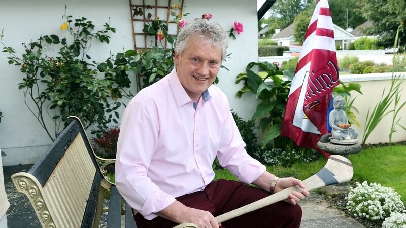 Iggy Clarke with a hurley from his playing days at his home in Oranmore. Photograph: Joe O’Shaughnessy