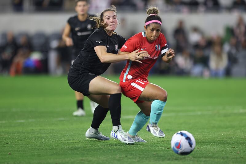 Vanessa Gilles of Angel City FC (left) and Desiree Scott of Kansas City Current during their  game at Banc of California Stadium on May 21st, 2022, in Los Angeles, California. Photograph: Katharine Lotze/Getty Images