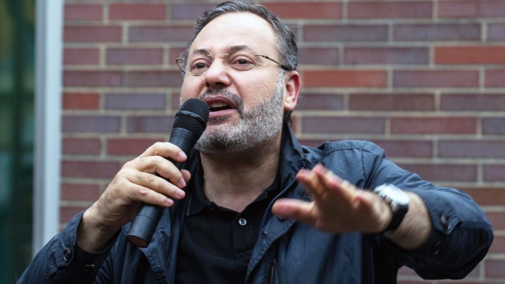 Egyptian journalist Ahmed Mansour speaks as he leaves a prison in Berlin. He spent two nights in custody. Photograph: Rainer Jensen/EPA