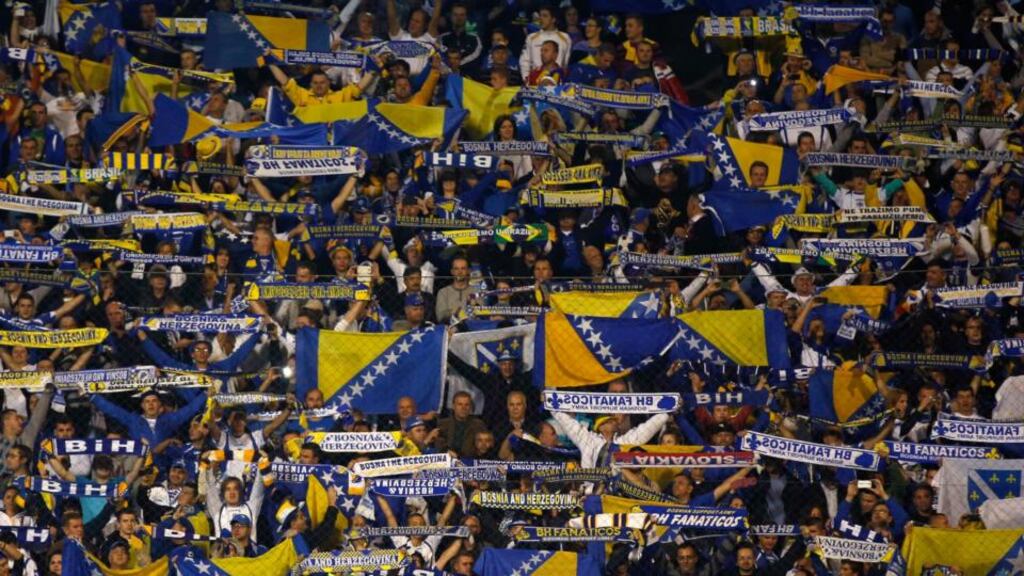 Bosnia fans cheer during their side’s victory in the World Cup qualification match against Liechtenstein in Zenica last Friday. Photograph: Reuters