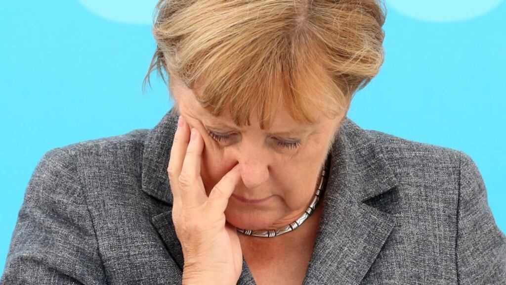 Under pressure: Angela Merkel in Neustrelitz. Photograph: Bernd Wuestneck/DPA