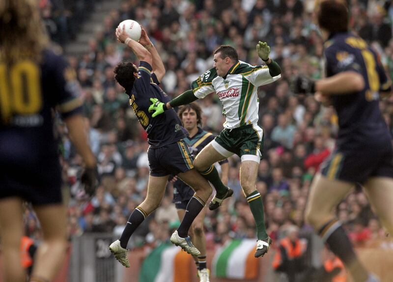 Paul Barden of Ireland and Ryan Crowley of Australia in action during the second test in November 2006 at Croke Park. Photograph; Donall Farmer/Inpho