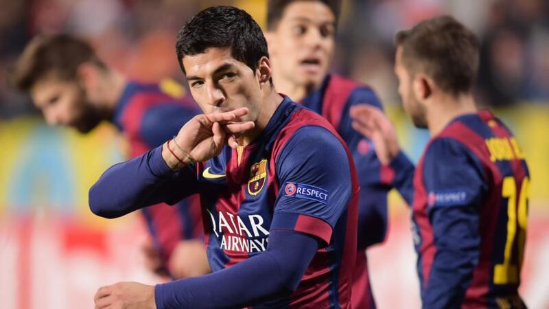Barcelona’s Luis Suarez celebrates his goal against APOEL Nicosia  at GSP Stadium in Nicosia. Photograph: Andreas Manolis / Reuters