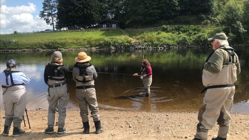World renowned fly-casting instructor, Glenda Powell demonstrating casting techniques on the River Blackwater.