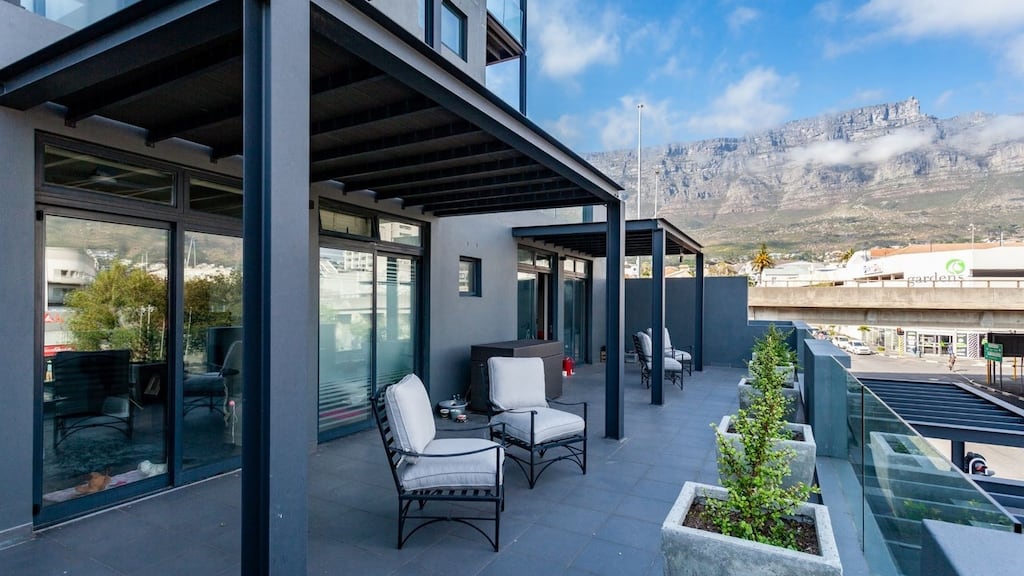 This Cape Town corner apartment has two balconies, giving 100sq m of outdoor living space