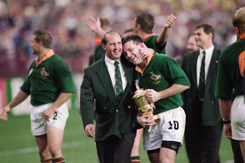 Springboks points scorer Joel Stransky is congratulated by head coach Kitch Christie after their 1995 Rugby World Cup final win against New Zealand at Ellis Park Stadium on June 24th, 1995 in Johannesburg, South Africa. Photograph: Shaun Botterill/ Allsport/Hulton Archive/Getty Images