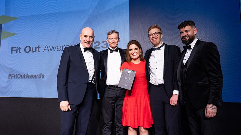 Denise Fitzgerald, head of sales, northern Europe at Procore, presents the fit out project of the year – hospitality (hotel) award to the Mola team