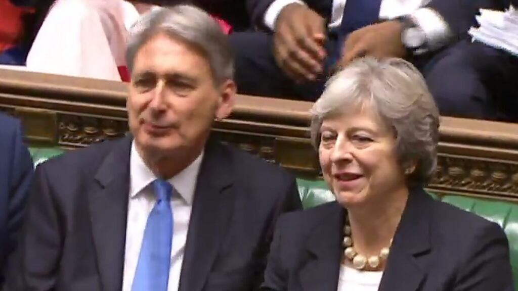 Britain’s chancellor of the exchequer Philip Hammond with prime minister Theresa May after he presented his budget statement in the House of Commons on Wednesday. Photograph: AFP/Getty Images
