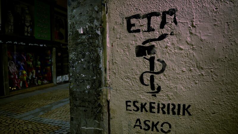 Graffiti reading “Eta, thanks” on wall two days after the militant Basque separatists announced their dissolution, in Bilbao. Photograph: Vincent West/Reuters