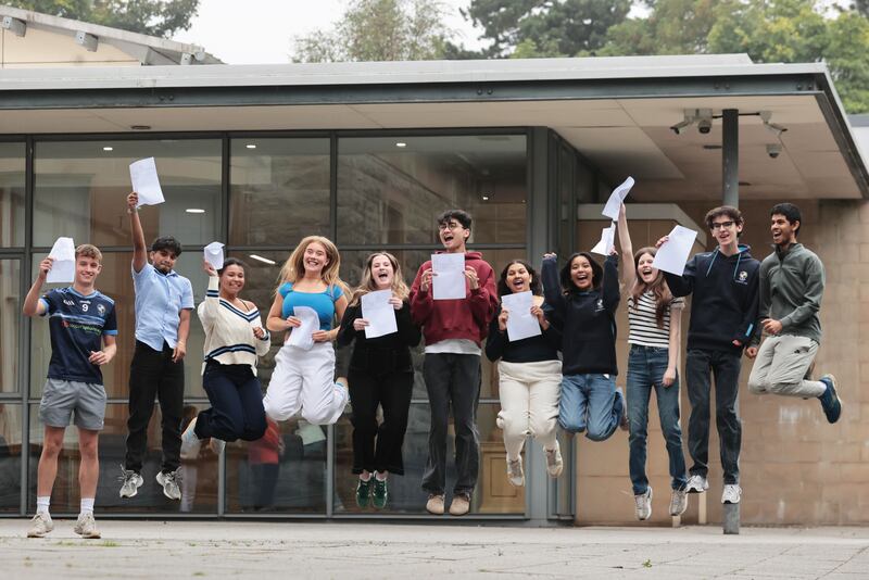Students celebrate their A-level results at Rathmore Grammar School, Belfast. Photograph: Liam McBurney/PA
