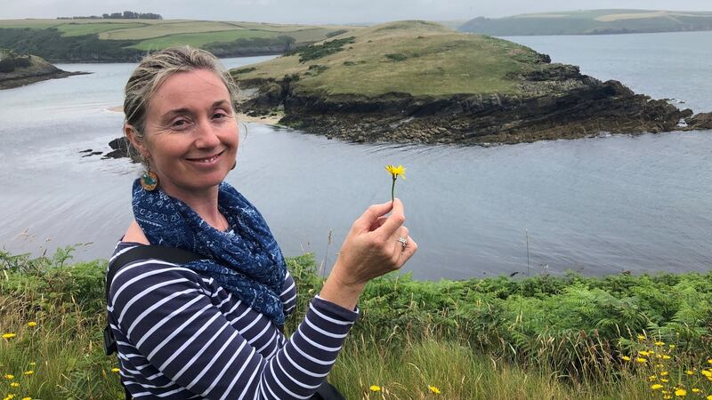 Suzanne Burns of Kinsale Food Tours on a coastal walk with the Pope family. Photograph: Conor Pope