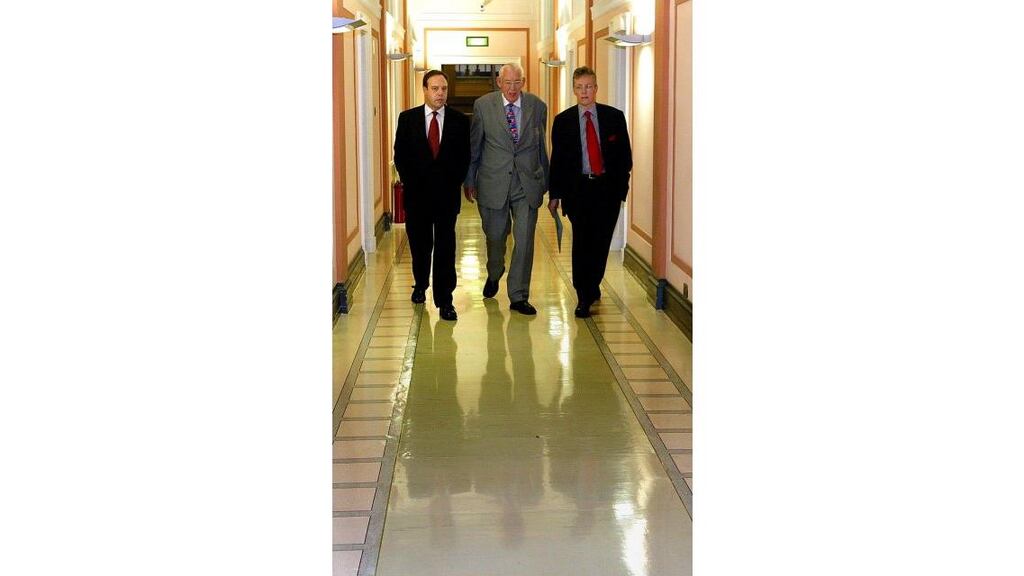 The DUP leader the Rev Ian Paisley with Mr Peter Robinson (right) and Mr Nigel Dodds. The party yesterday put forward proposals on how it would operate the North-South element of the Belfast Agreement.