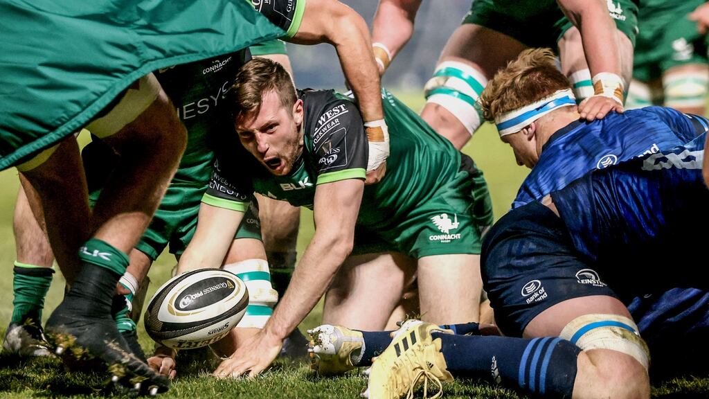 Jack Carty celebrates scoring one of his two tries in the opening half against Leinster. Photograph: Dan Sheridan/Inpho