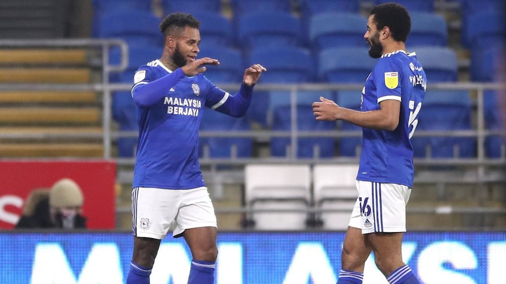 Cardiff City’s Leandro Bacuna (left) celebrates scoring his side’s first goal of the game with team-mate Curtis Nelson during the Sky Bet Championship match against Derby County at the Cardiff City Stadium. Photograph: Nick Potts/PA Wire