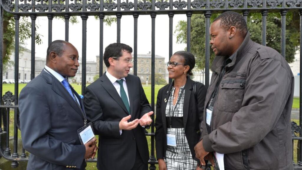 Senator Rónán Mullen speaking to asylum seakers in direct provision at Mosney and Portlaoise Maurice Kiesse, Patricia Murambinda, and Gerald Musekiwa. Photograph: Alan Betson