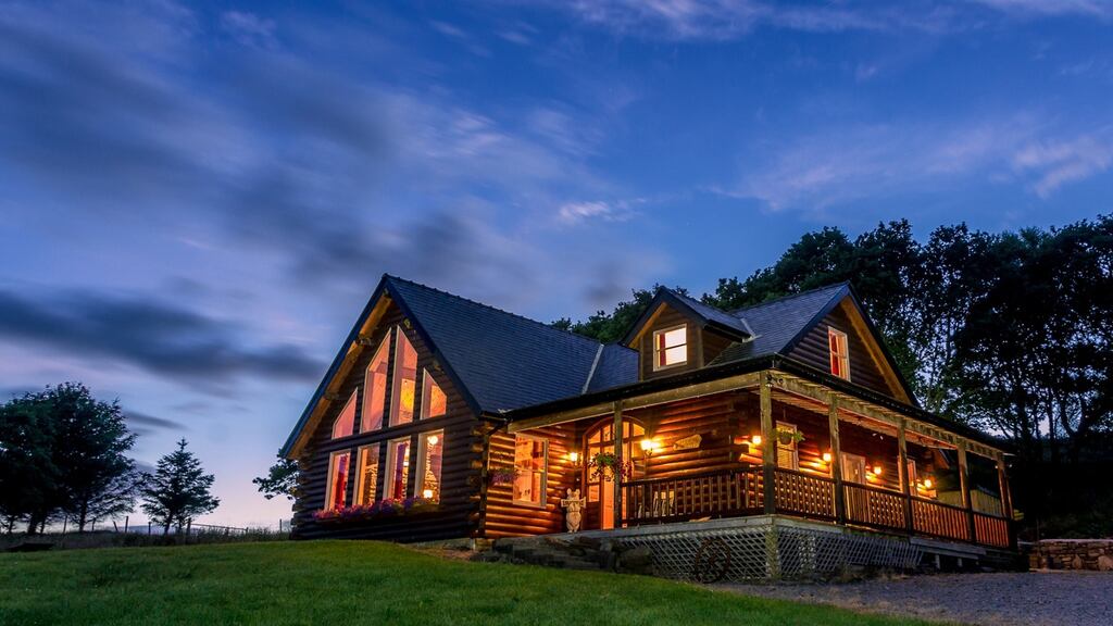 Eagle Lodge, a wooden chalet overlooking a lake in Co Mayo, was built in 2005 and has a wooden pod, with room for two people, on the grounds