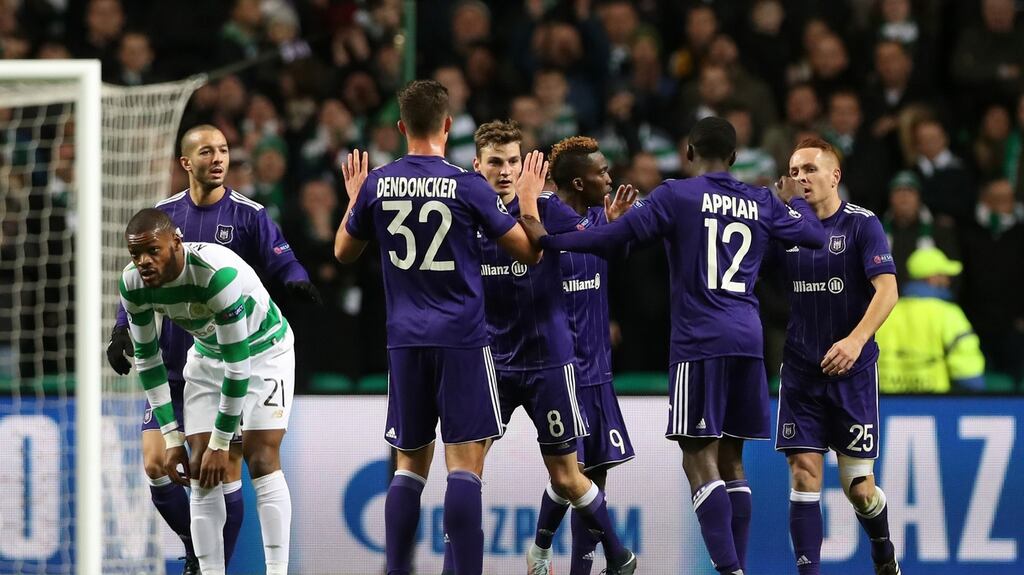 Anderlecht celebrate Jozo Simunovic’s own goal at Celtic Park. Photograph: Ian MacNicol/Getty