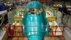 Boeing raises full-year profit forecast