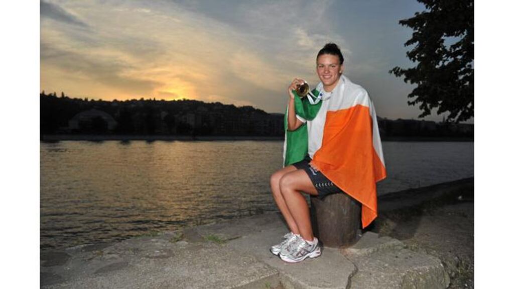Ireland's Gráinne Murphy with her silver medal after finishing second in the final of the women's 1500m freestyle at the European Championships in Budapest. (Photograph: Brian Lawless/SPORTSFILE)