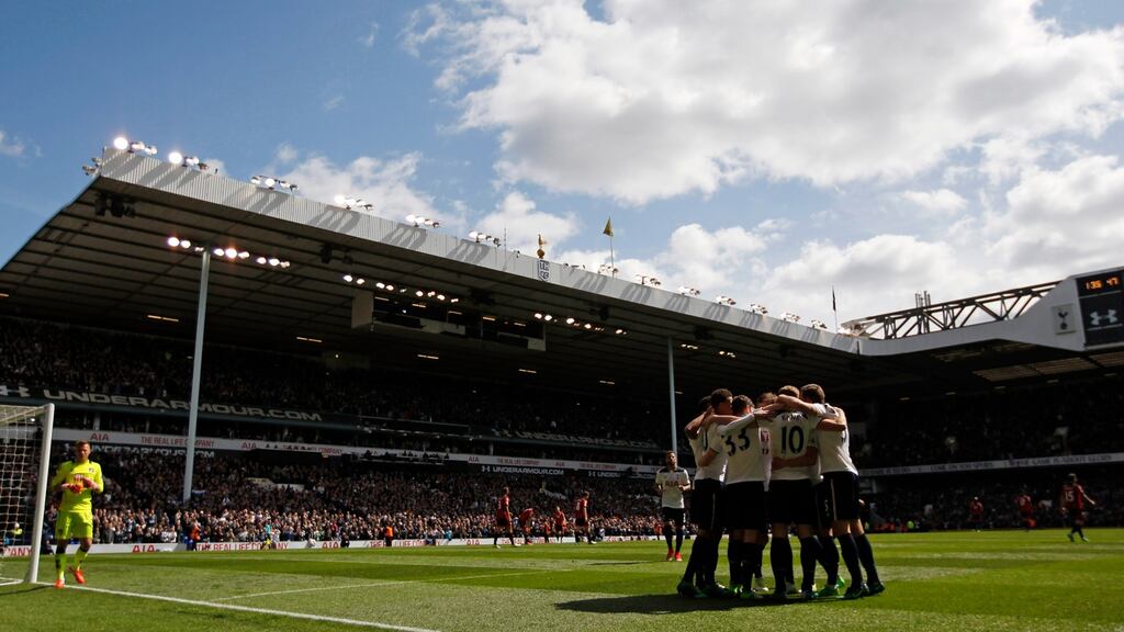 Tottenham players gather to celebrate Harry Kane celebrates scoring their third goal against Bournemouth last Saturday. Photograph: Paul Childs/Livepic/Reuter