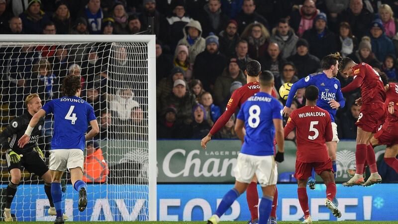Liverpool’s Brazilian attacker Roberto Firmino scores against Leicester City. Photograph: Getty Images