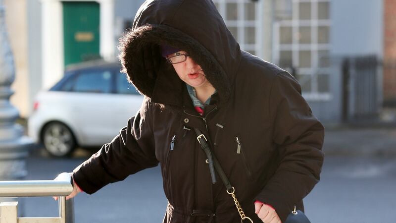 Geraldine Delahunty (41) of Ballyfermot, Dublin, leaving the Dublin District Court today where she appeared on charges of the Non Fatal Offences Against the Person Act for alleged harrassment of radio DJ Jeremy Dixon. Photograph: Collins