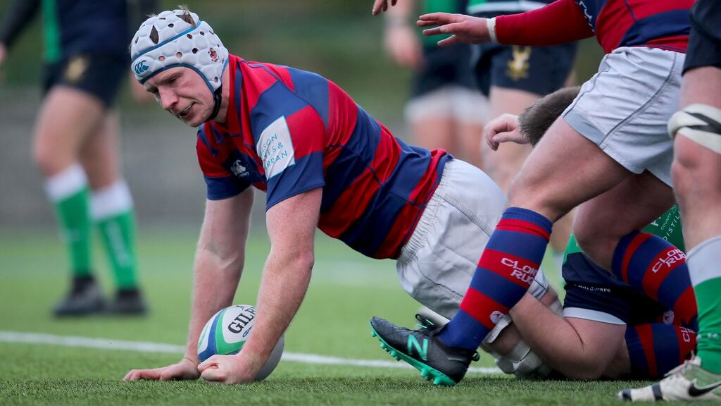 Clontarf’s Tom Byrne scores a try during the Division 1A win over Ballynahinch at Castle Avenue. Photograph: Oisín Keniry/Inpho