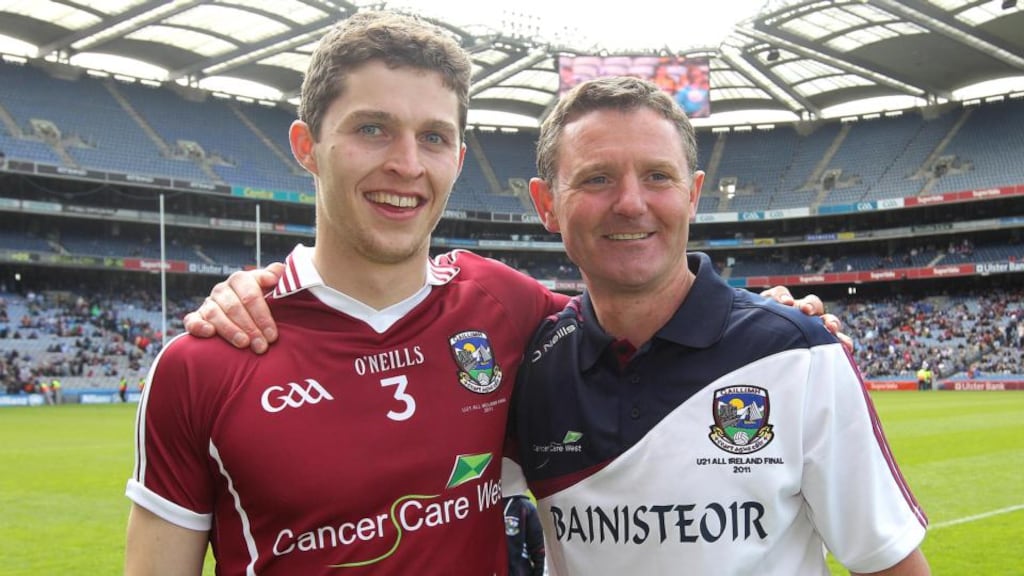 Colin Forde with Galway coach Alan Mulholland after winning the All-Ireland Under-21 Football final in 2011. Photograph: Lorraine O’Sullivan/Inpho