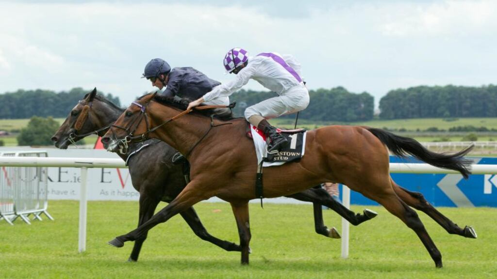 Seamie Heffernan onboard Mekong River wins the race ahead of Kevin Manning on Parish Hall. Photo: Morgan Treacy/Inpho