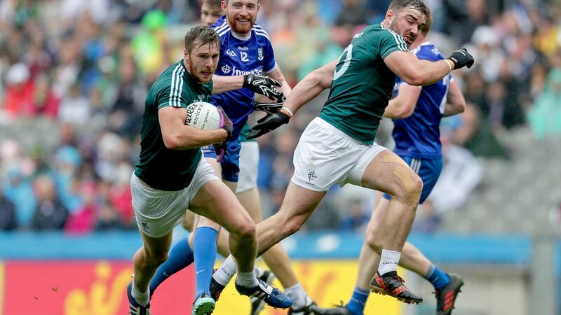 Kildare’s Johnny Byrne and Fergal Conway make a break. Photograph: Laszlo Geczo/Inpho
