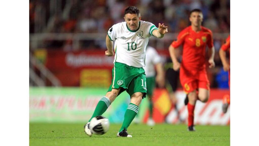 Robbie Keane scores his second of hte night and 51st of his career against Macedonia at the Phillip II Arena in Skopje. - (Photograph: Donall Farmer/Inpho)