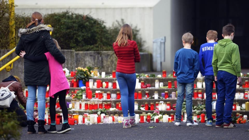 Students gather at a memorial of flowers and candles in front of the Joseph-Koenig-Gymnasium secondary school in Haltern am See, western Germany from where some of the Germanwings plane crash victims came. Sixteen German teenagers and two teachers on a school exchange trip were assumed to be among the 150 dead in the crash. Photograph: Sascha Schuermann/AFP/Getty Images