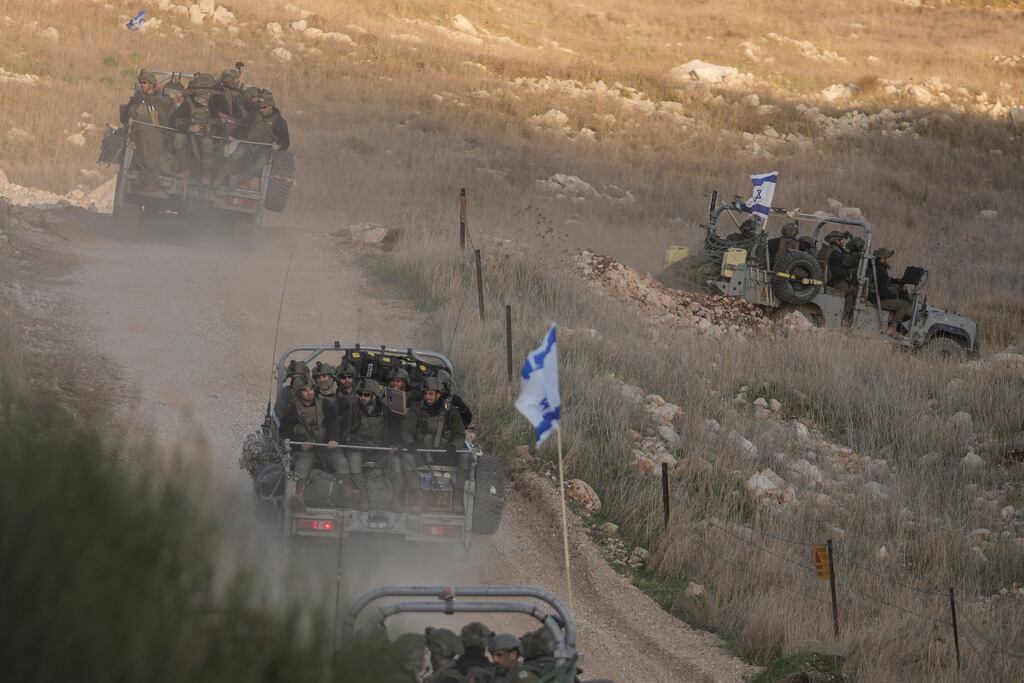 Israeli soldiers cross the security fence moving towards the so-called Alpha Line that separates the Israeli-annexed Golan Heights from Syria. Recent events have restored Israel’s position as the region’s pre-eminent military force. Photograph: Matias Delacroix/AP