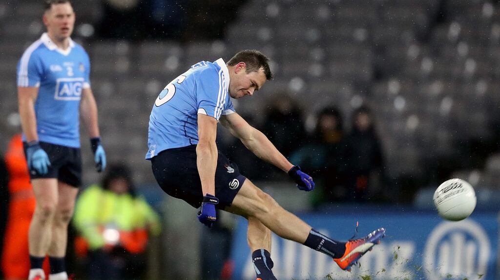 Dublin’s Dean Rock kicks a point to level the Division 1 game late on against Tyrone in February. Photo: Tommy Dickson/Inpho