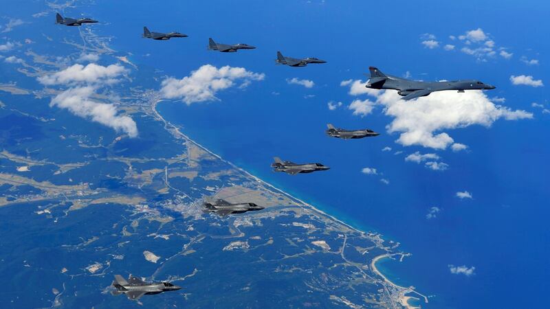 A file image shows a US air force B-1B Lancer bomber (R) flying over South Korea during a military drill. File photograph: South Korean defence ministry/AFP/Getty Images