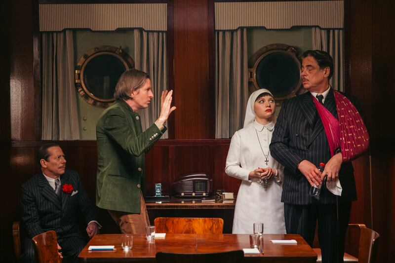 Mathieu Amalric, Wes Anderson, Mia Threapleton and Benicio Del Toro during filming of The Phoenician Scheme. Photograph: Roger Do Minh/TPS Productions/Focus Features